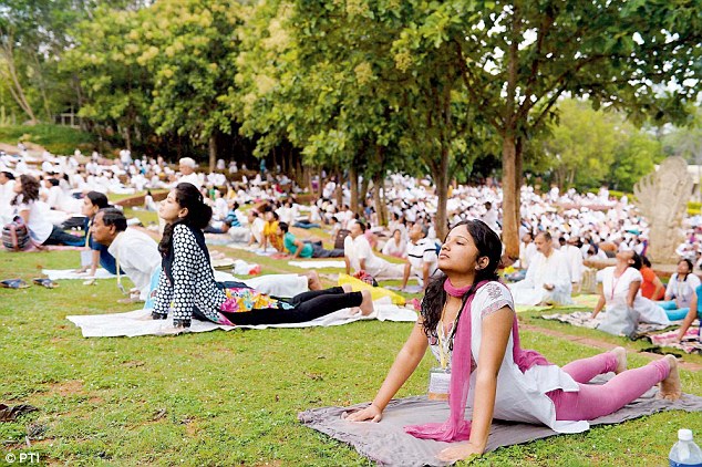 Well, it beats filing Centre wants yoga to be COMPULSORY in the workplace to help cut staff stress and depression